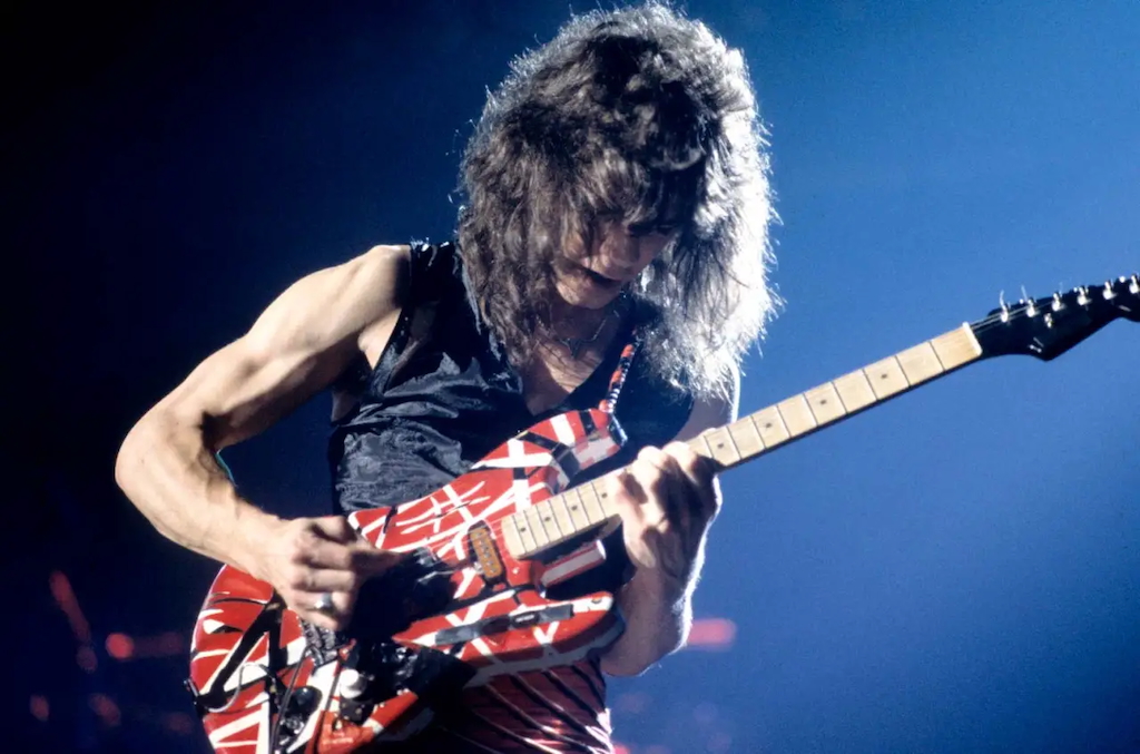 Eddie Van Halen from Van Halen performs live on stage during their 1980 US tour.